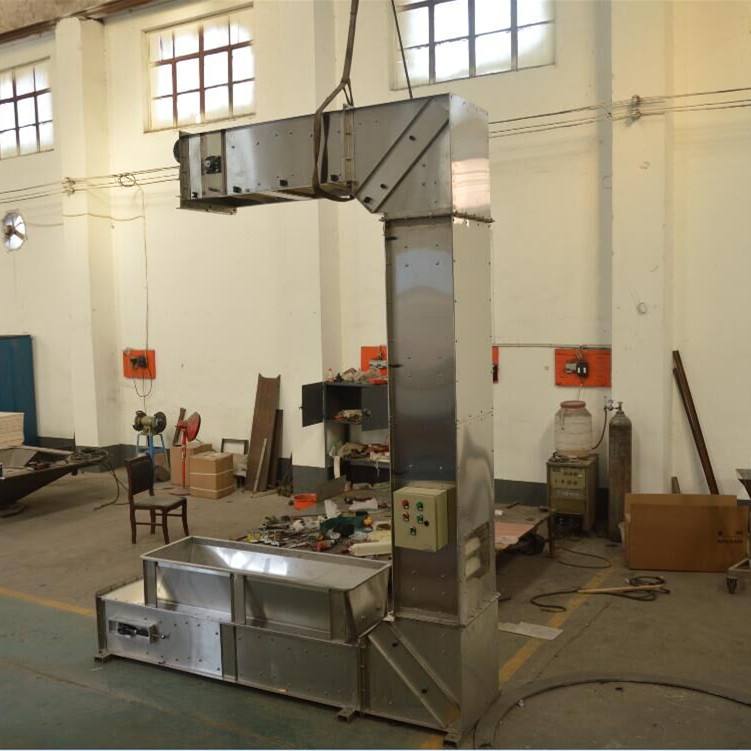 斗式提升机的料斗滑防及处升料机式方理 斗式提升机的料斗滑防及处升料机式方理